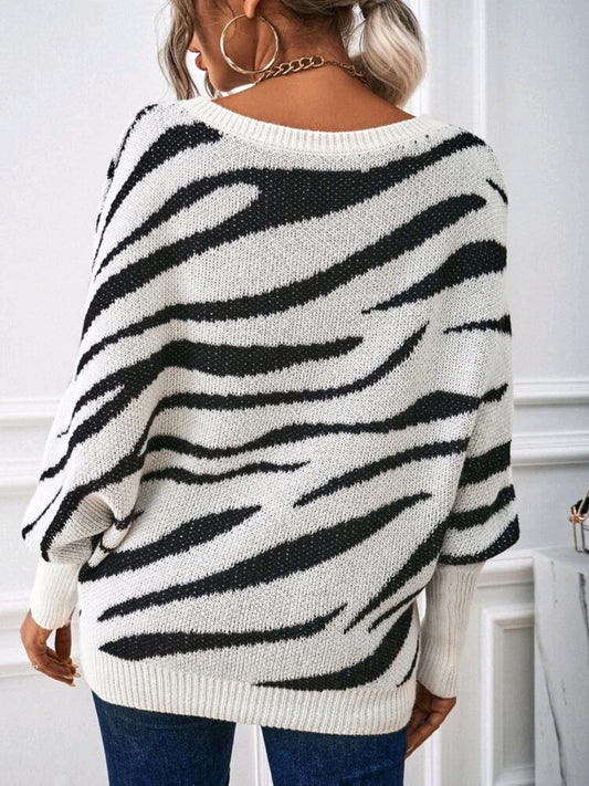 Sueter tejido con patron de rayas de cebra, de manga murcielago