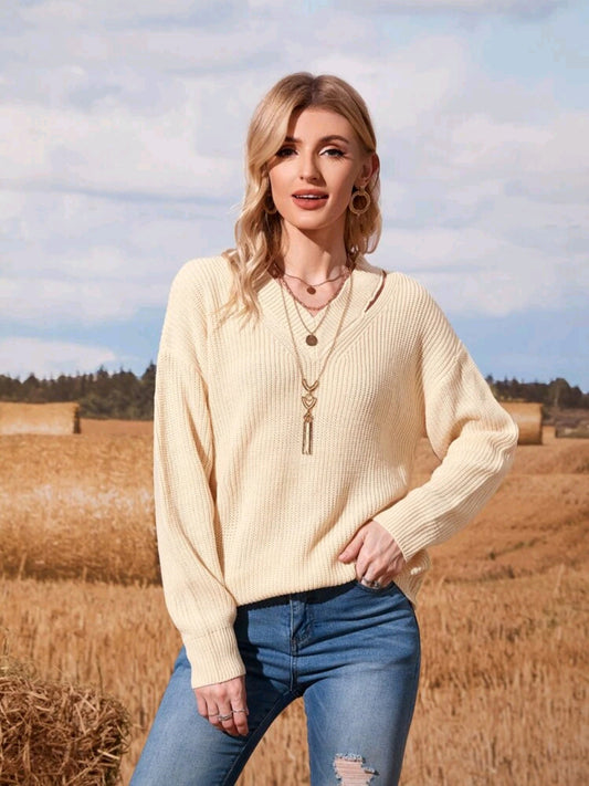 Sueter  tejido con abertura en un hombro