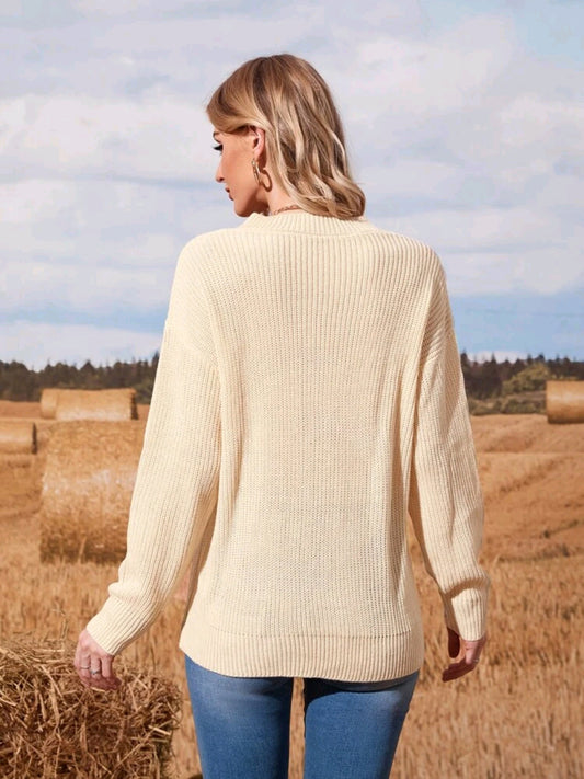 Sueter  tejido con abertura en un hombro